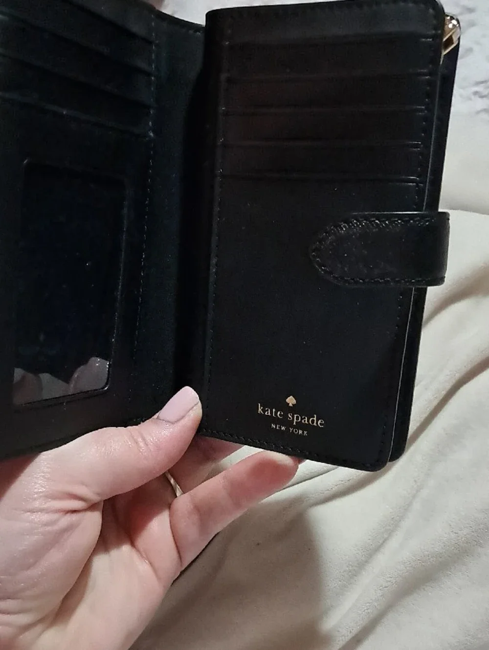 kate spade black saffiano continental wallet with gold-tone logo